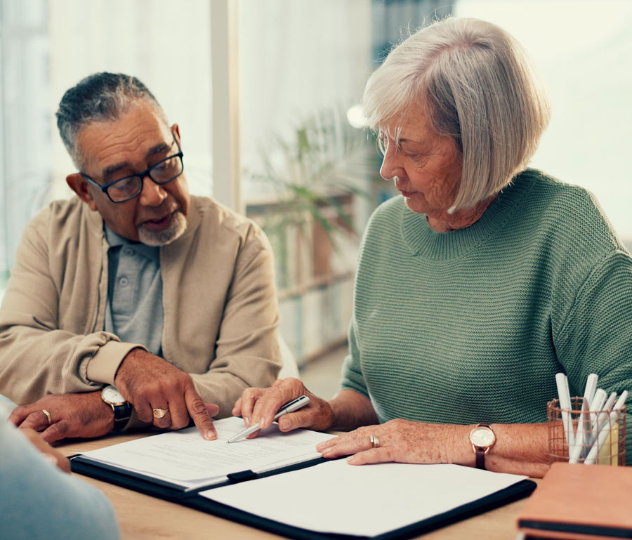 Couple looking at life insurance options